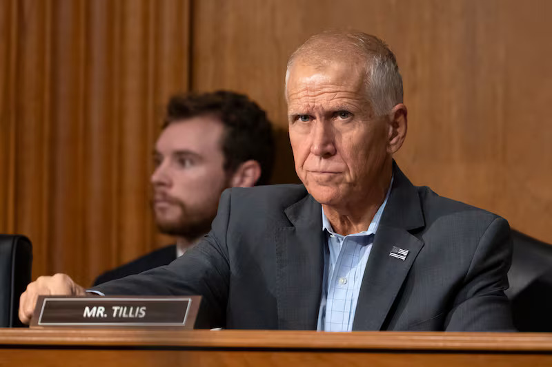 Sen. Thom Tillis, R-N.C., arrives for a hearing of the Senate Finance Committee on Capitol Hill, Thursday, in Washington.