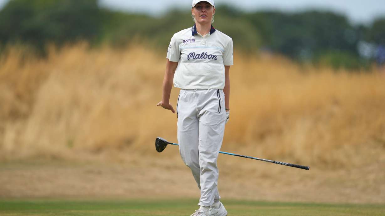 Charley Hull, of England, drops her club after driving off the 3rd tee during the fourth round of the Women's British Open golf championship in Lytham St Annes, England, Sunday, Aug. 2, 2026.