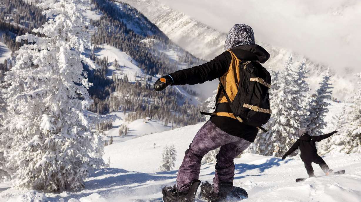 Snowboarders are pictured at Snowbird in Little Cottonwood Canyon on Jan. 9. Meteorologists are looking ahead as the odds of a strong El Niño grow, which may affect Utah's upcoming winter. Skiers and snowboarders are hopeful the state will have a strong winter.