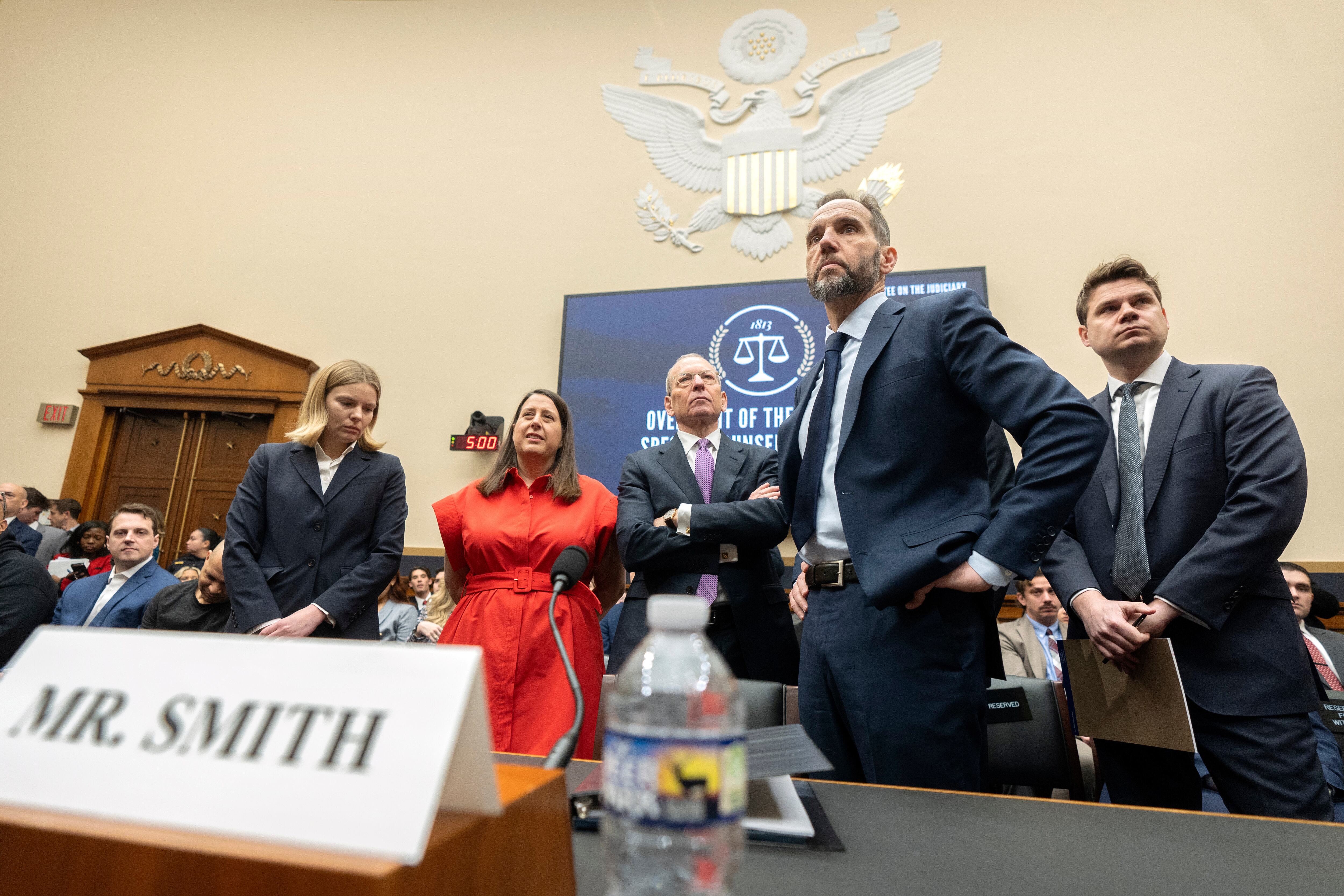 Former Justice Department special counsel Jack Smith, second from right, arrives before a hearing of the House Judiciary Committee at the Capitol in Washington, Jan. 22.