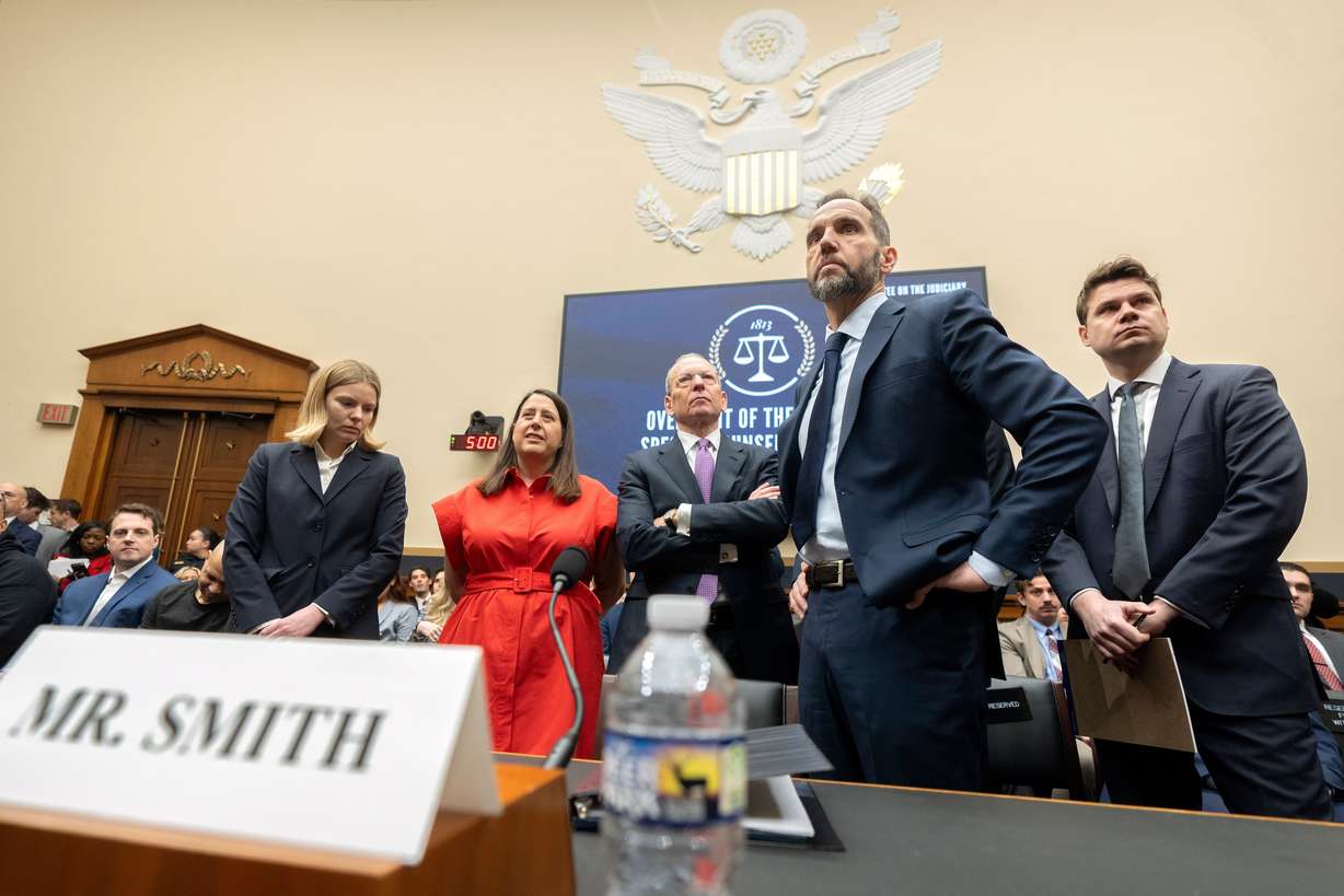 Former Justice Department special counsel Jack Smith, second from right, arrives before a hearing of the House Judiciary Committee at the Capitol in Washington, Jan. 22.