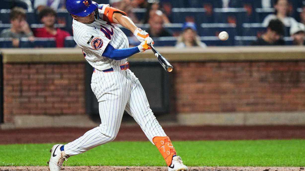 New York Mets' Tyrone Taylor hits a three-run home run during the seventh inning of a baseball game against the Atlanta Braves Monday, July 27, 2026, in New York.