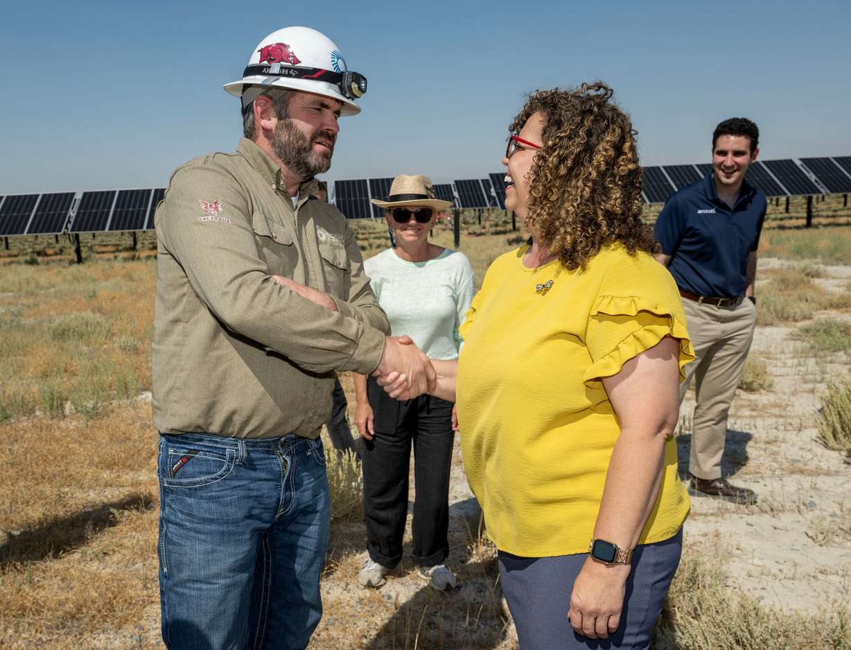 Jonathan Schilling, field service lead for Solv Energy, shakes hands with Rep. Celeste Maloy, R-Utah, as she joins industry leaders and community stakeholders as Solv Energy visits the Desri Horseshoe site in Tooele County as they showcase innovation and investment in the energy sector on Monday, Aug. 3, 2026.