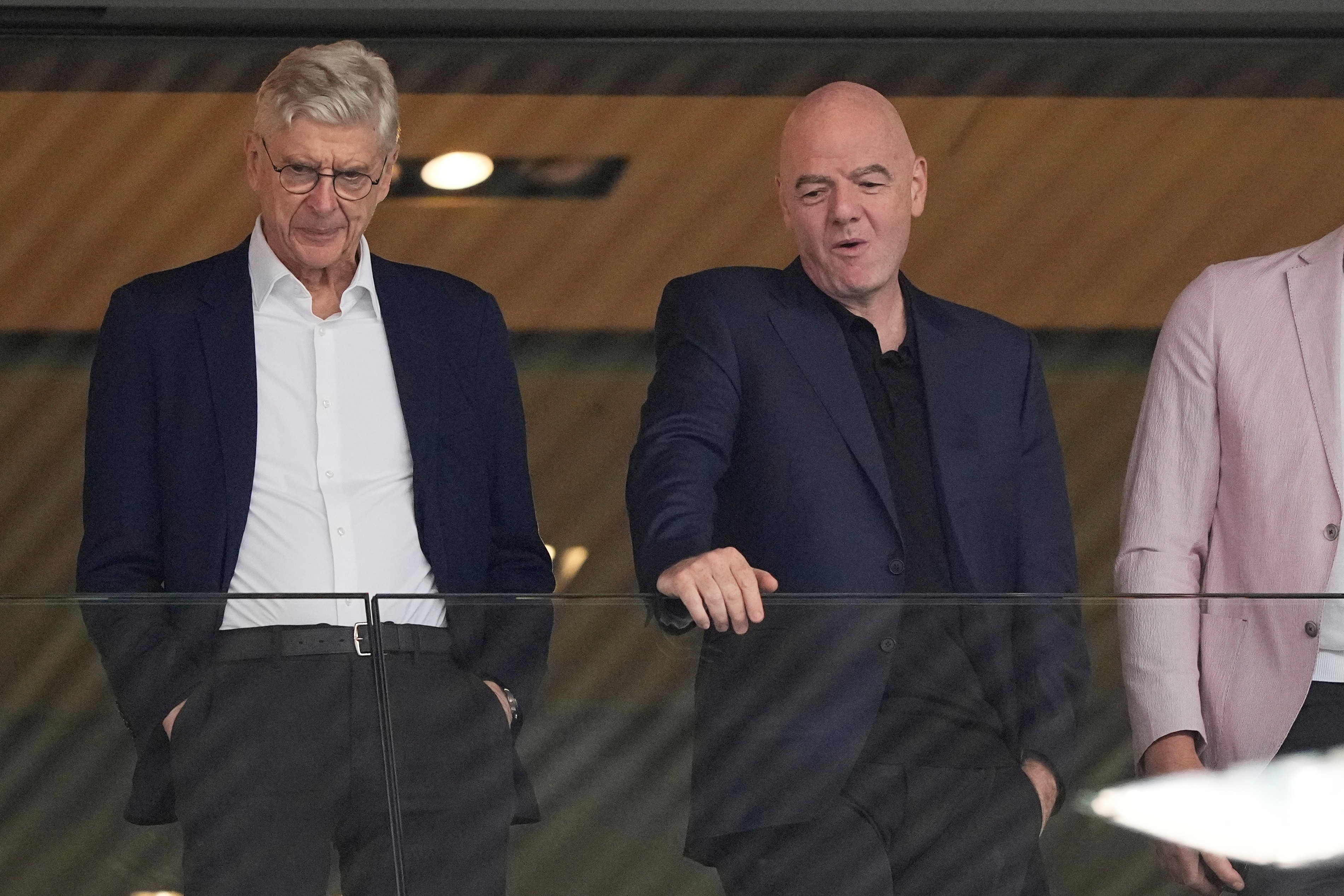 FILE - FIFA president Gianni Infantino, right, and Arsene Wenger, Chief Officer (FIFA) and former soccer coach arrive for the Women's Euro 2025 quarterfinals soccer match between Sweden and England at Stadion Letzigrund in Zurich, Switzerland, Thursday, July 17, 2025. 