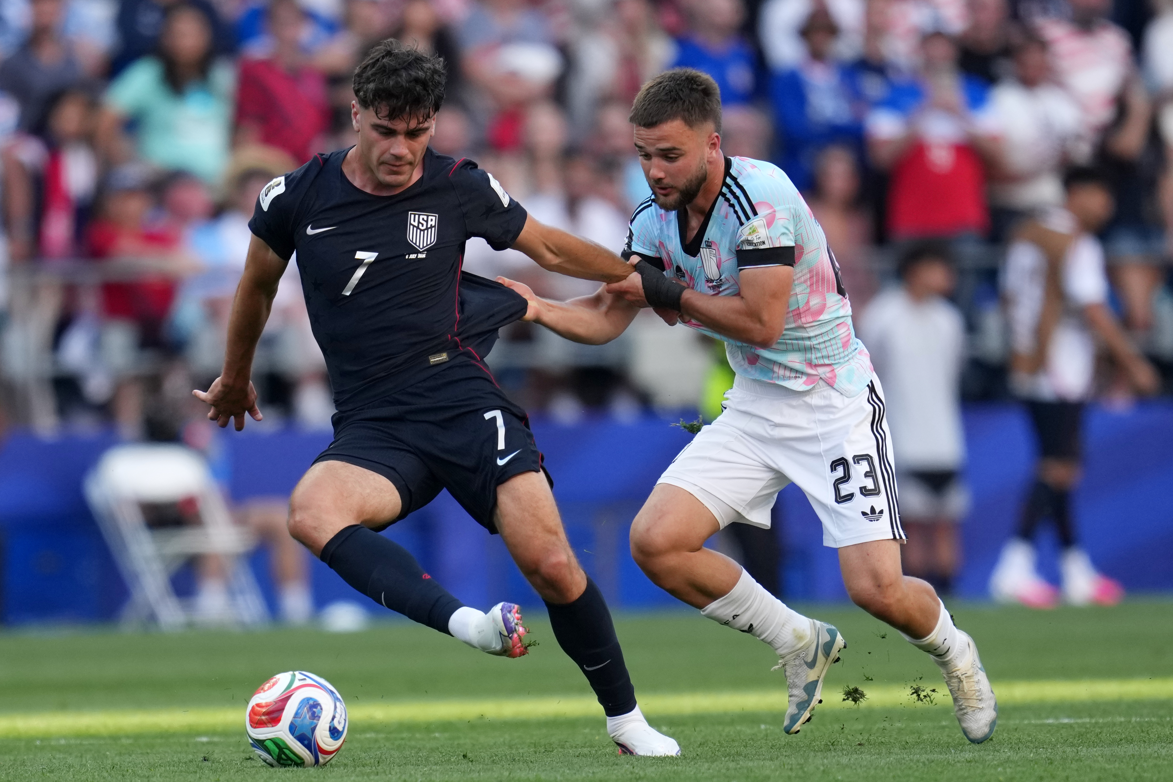 United States' Giovanni Reyna (7) controls the ball against Belgium's Nicolas Raskin (23) during the World Cup round of 16 soccer match between the United States and Belgium in Seattle, Monday, July 6, 2026. 