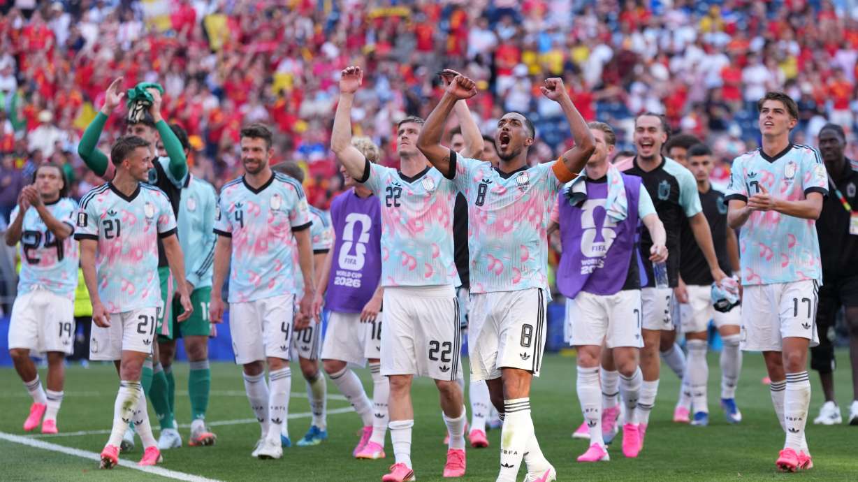 Belgium players celebrate after they won a World Cup round of 16 soccer match against the United States in Seattle, Monday, July 6, 2026.