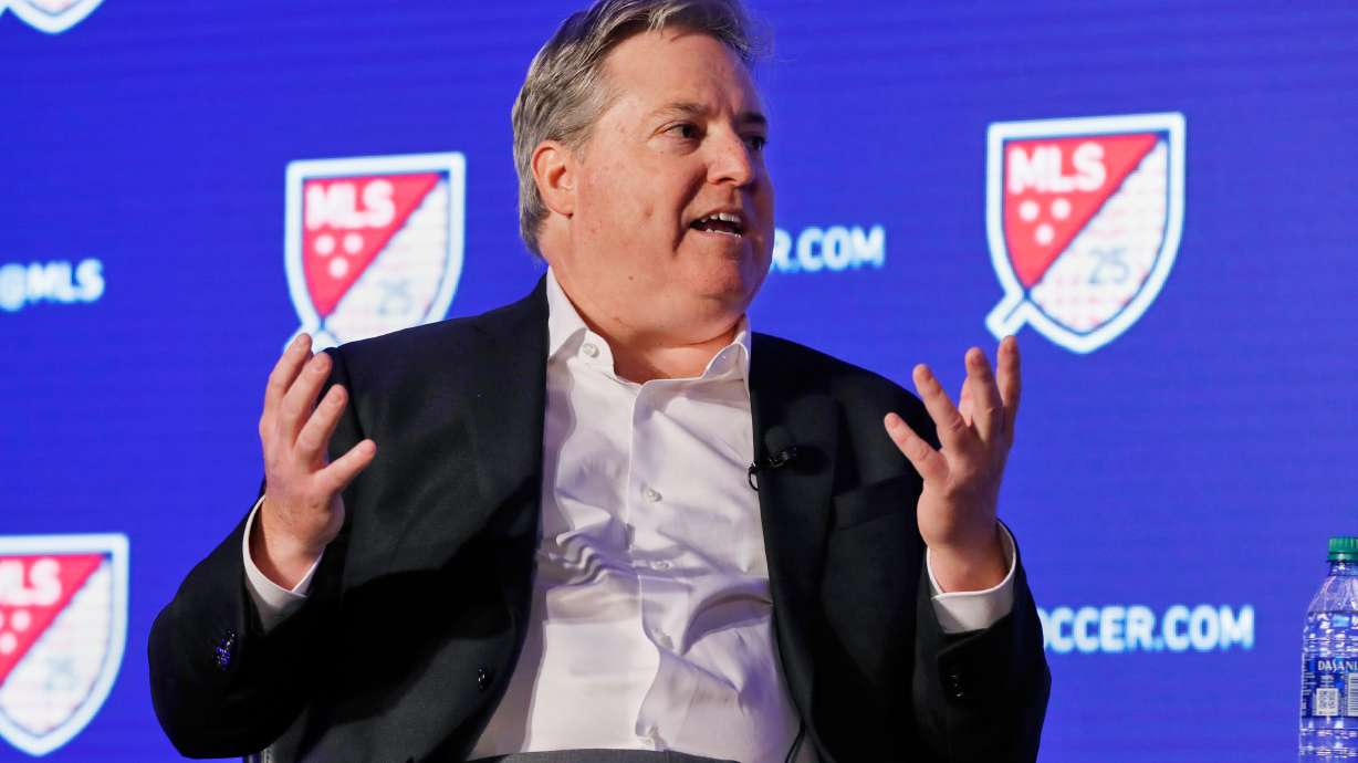 FILE - Los Angeles FC lead owner Larry Berg gestures during an interviewed at the Major League Soccer 25th Season kickoff event in New York, Feb. 26, 2020.