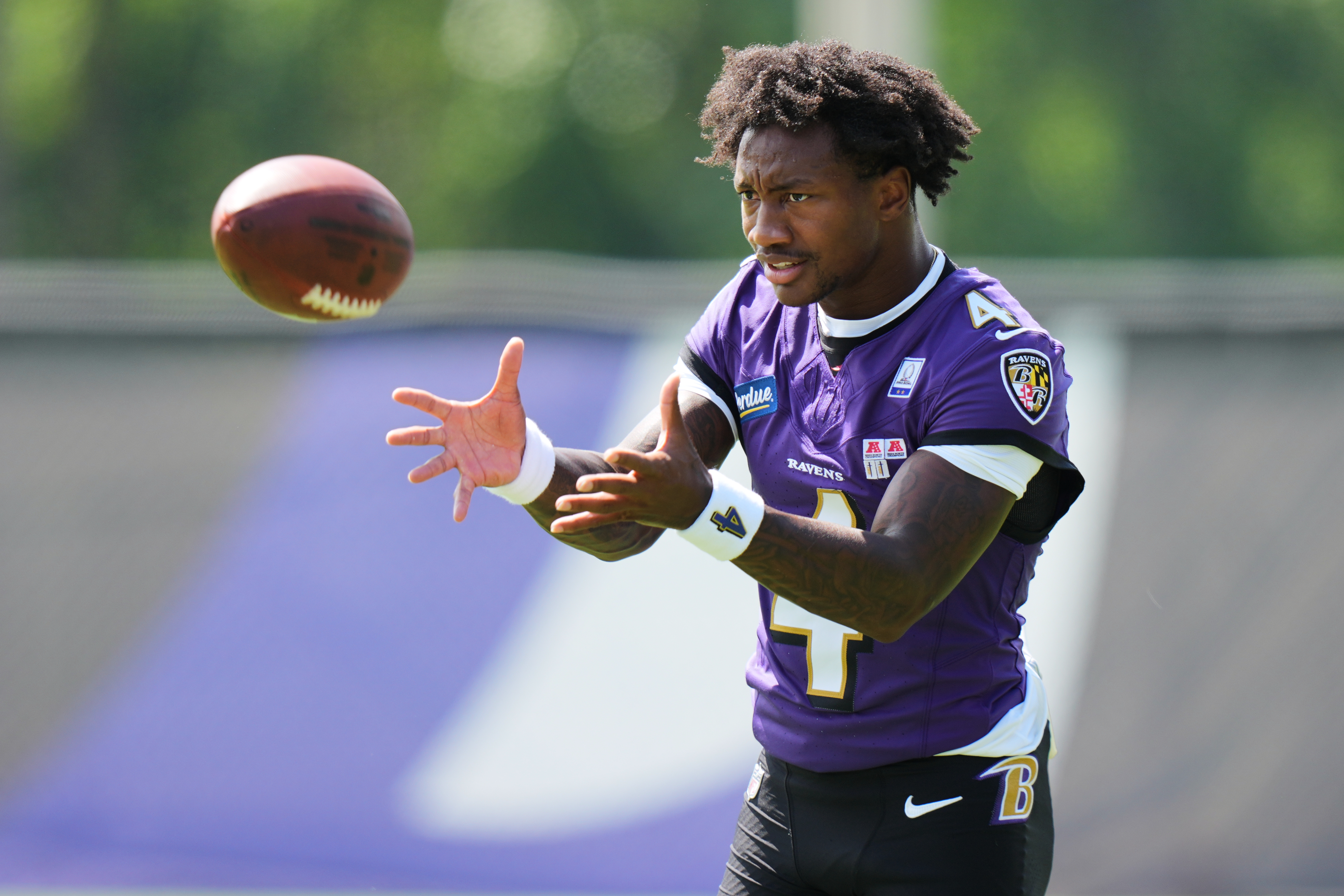 Baltimore Ravens wide receiver Zay Flowers (4) works out during practice at the team's NFL football training camp, Wednesday, July 29, 2026, at the Under Armour Performance Center in Owings Mills, Md. 