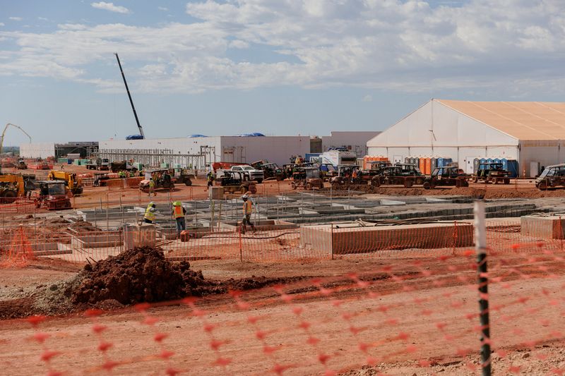 Data center buildings are under construction during a tour of the OpenAI data center in Abilene, Texas, Sept. 23, 2025. A total of eight data center buildings are planned to exist on the campus.