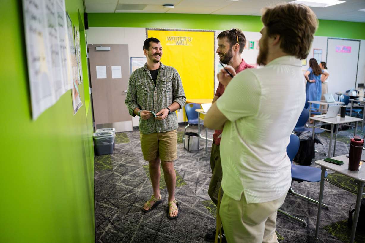 New teachers Cody Wright, Ammon Hatch and Riley Haug participate in new teacher training at Union Middle School in Sandy on Tuesday. Teachers are entering the classroom at a critical point in education.