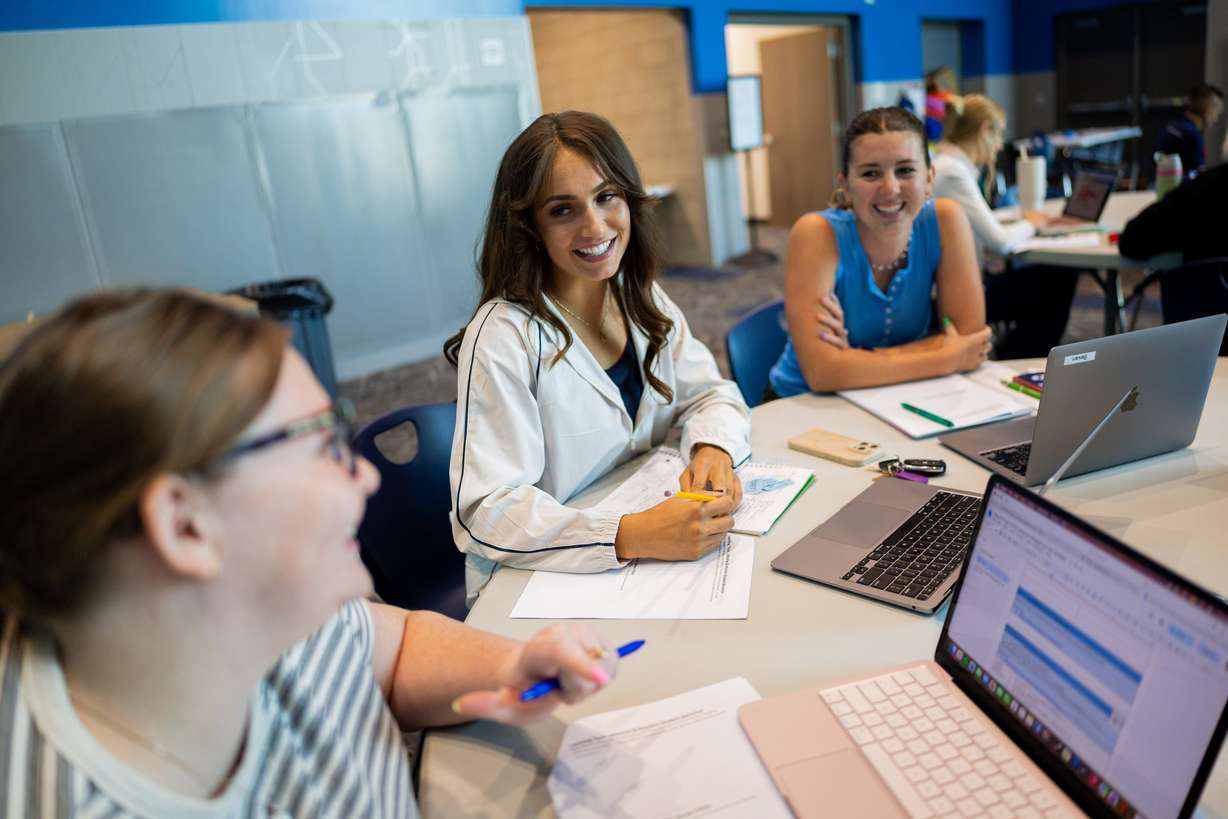 New teachers Grace Petersen, Spanish teacher at Midvale Middle School, Haley Dansie, P.E. teacher at Draper Park Middle School, and Sadie Bevan, strength and conditioning/health teacher at Union Middle School, participate in new teacher training at Union Middle School in Sandy on Tuesday. Teachers are entering the classroom at a critical point in education.