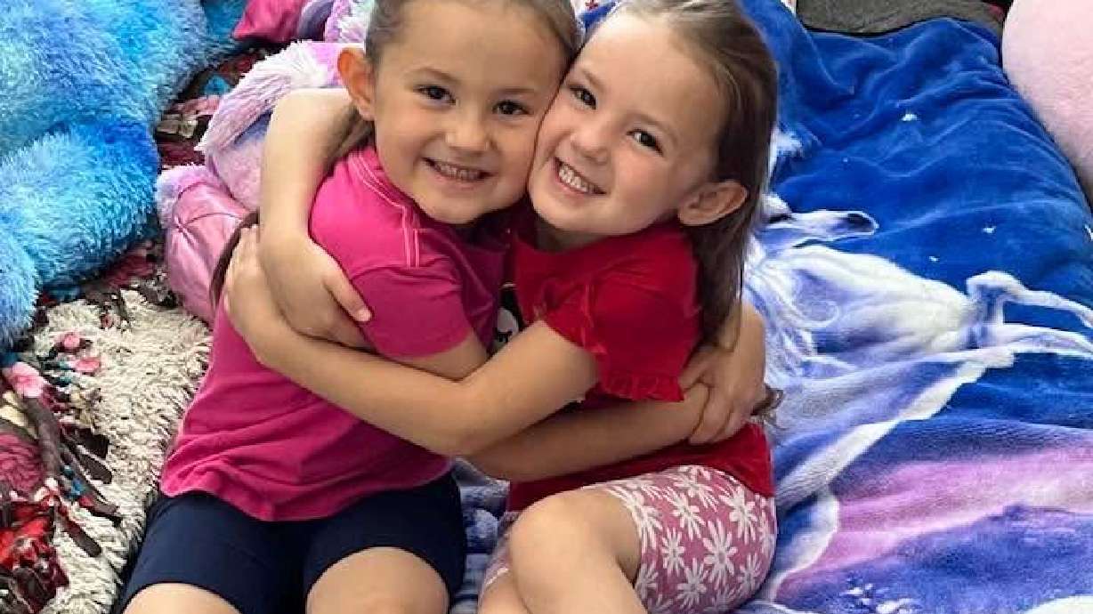 Leneah Taeoalii, 10, on left and her sister Natia, 9, on right.