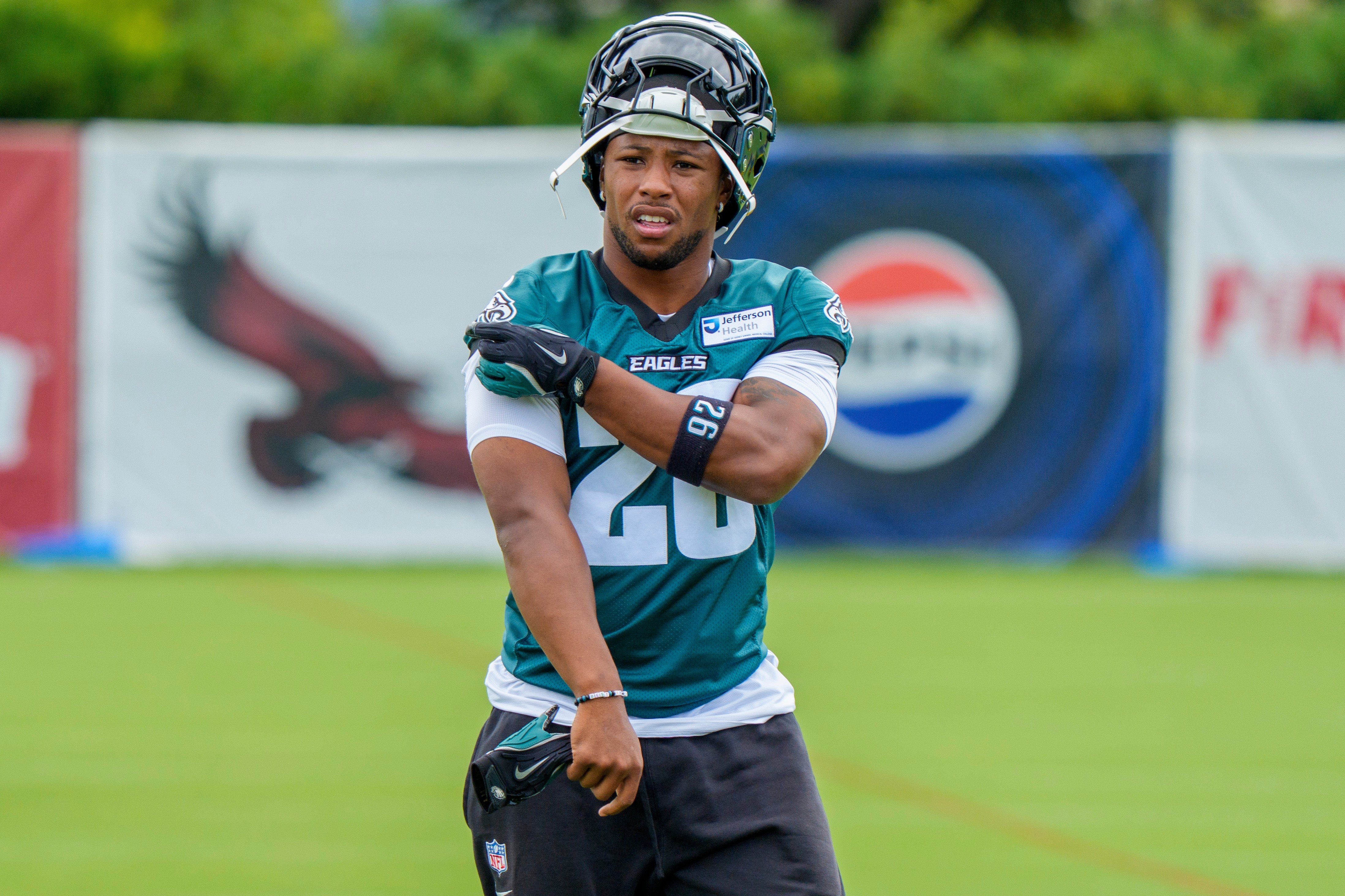 Philadelphia Eagles running back Saquon Barkley (26) looks on during practice at the team's NFL football training camp in Philadelphia, Thursday, July 30, 2026. 