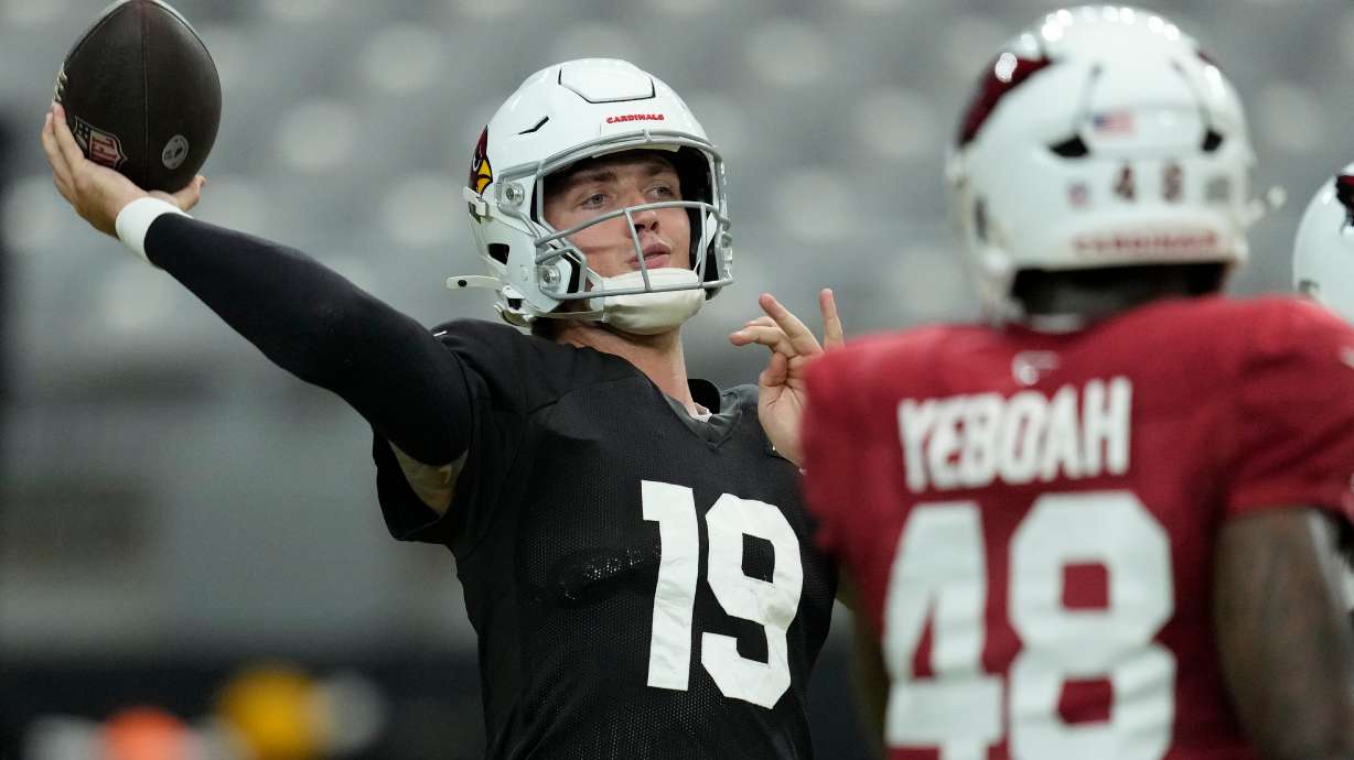 Arizona Cardinals quarterback Carson Beck throws during practice at the NFL football team's training camp, Sunday, Aug. 2, 2026, in Glendale, Ariz.