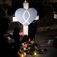 Hundreds mourn victims of Idaho In-N-Out shooting at candlelight vigil