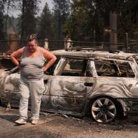 Firefighters get a handle on Spokane wildfires as tens of thousands remain evacuated