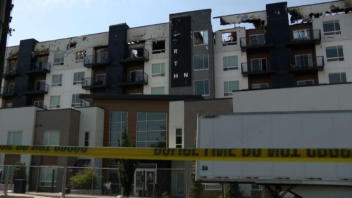 North Union Apartments are pictured on Wednesday. People who evacuated after a large apartment complex caught fire are being allowed back inside to try to salvage any belongings.