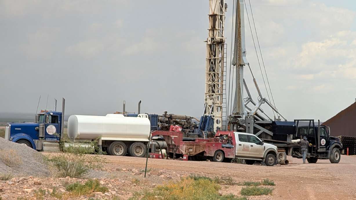 Construction crews drill wells for border wall construction in July in Luna County, N.M., along the US-Mexico border.