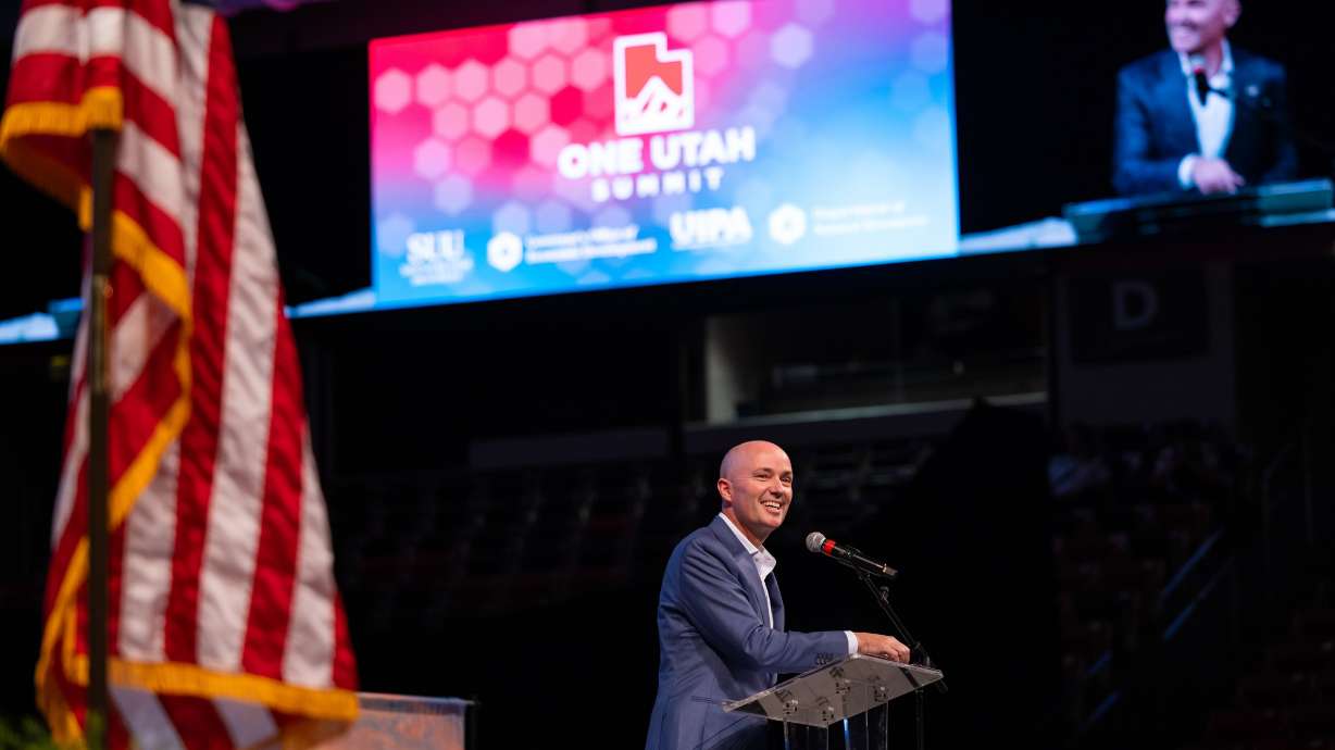 Gov. Spencer Cox speaks Tuesday at the One Utah Summit at Southern Utah University in Cedar City. Cox, while speaking to Utah business leaders and others invested in building the state, shared Utah's latest triumph.