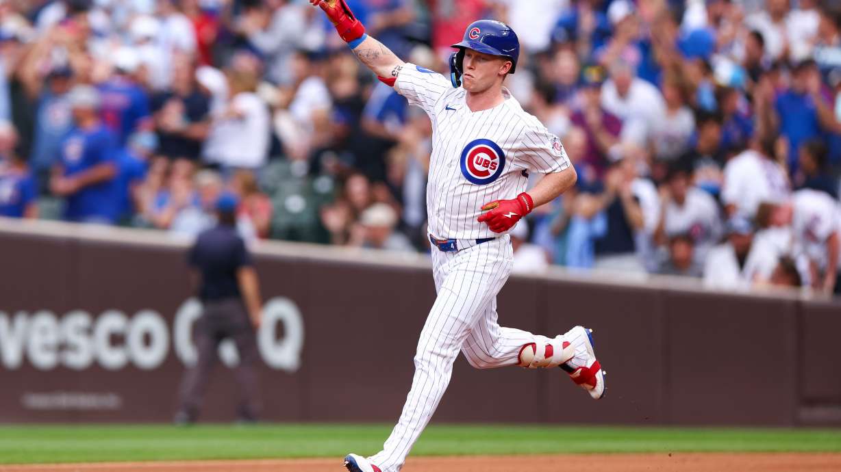 Chicago Cubs designated hitter Pete Crow-Armstrong gestures while running the bases after hitting a home run during the fourth inning of a baseball game against the Los Angeles Dodgers in Chicago, Wednesday, Aug. 5, 2026.