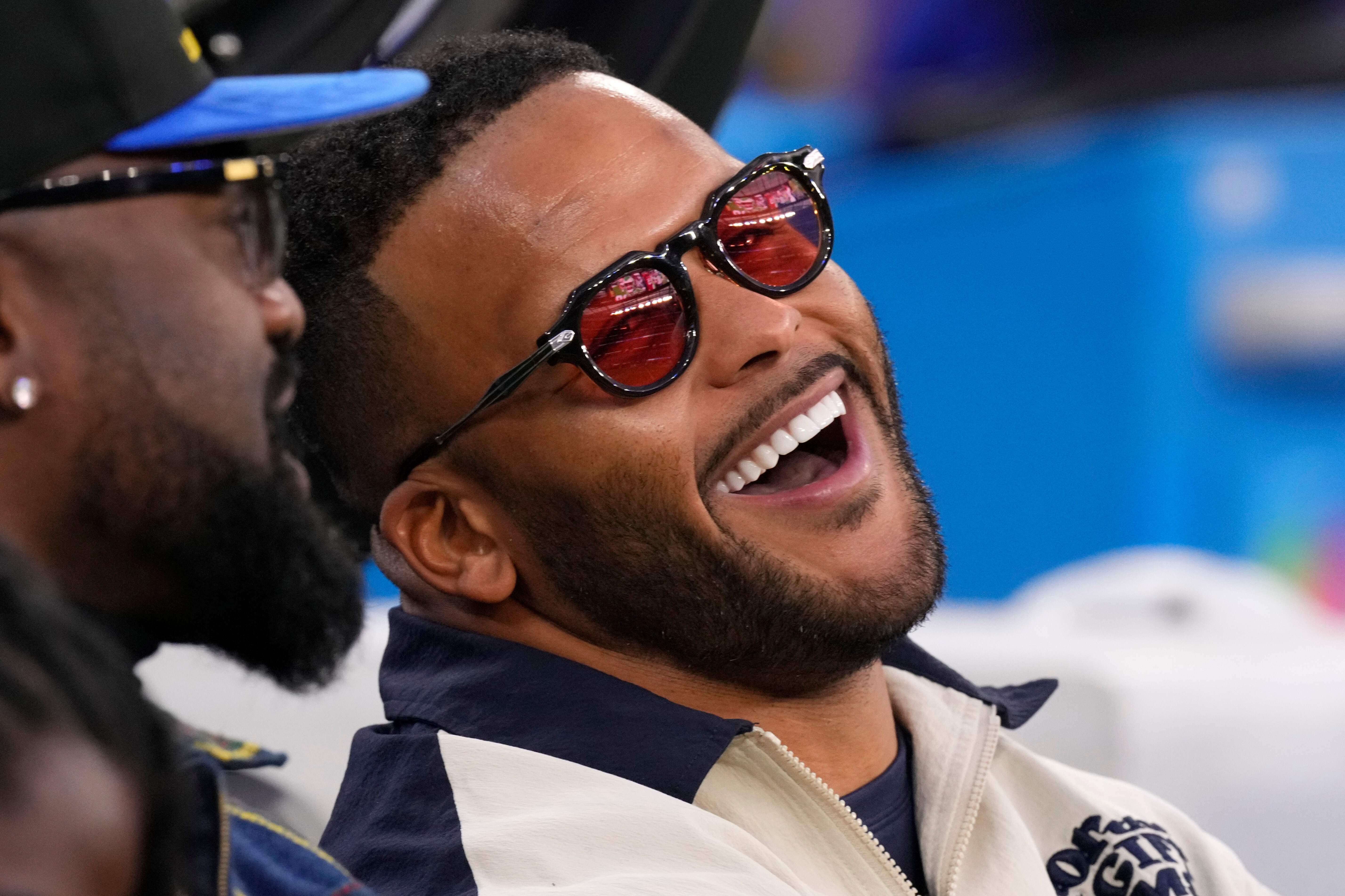 FILE - Former Los Angeles Rams player Aaron Donald looks on before an NFL football game between the Los Angeles Rams and the Tampa Bay Buccaneers, Nov. 23, 2025, in Inglewood, Calif. 