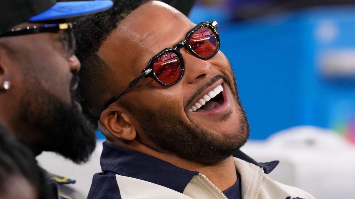 FILE - Former Los Angeles Rams player Aaron Donald looks on before an NFL football game between the Los Angeles Rams and the Tampa Bay Buccaneers, Nov. 23, 2025, in Inglewood, Calif.