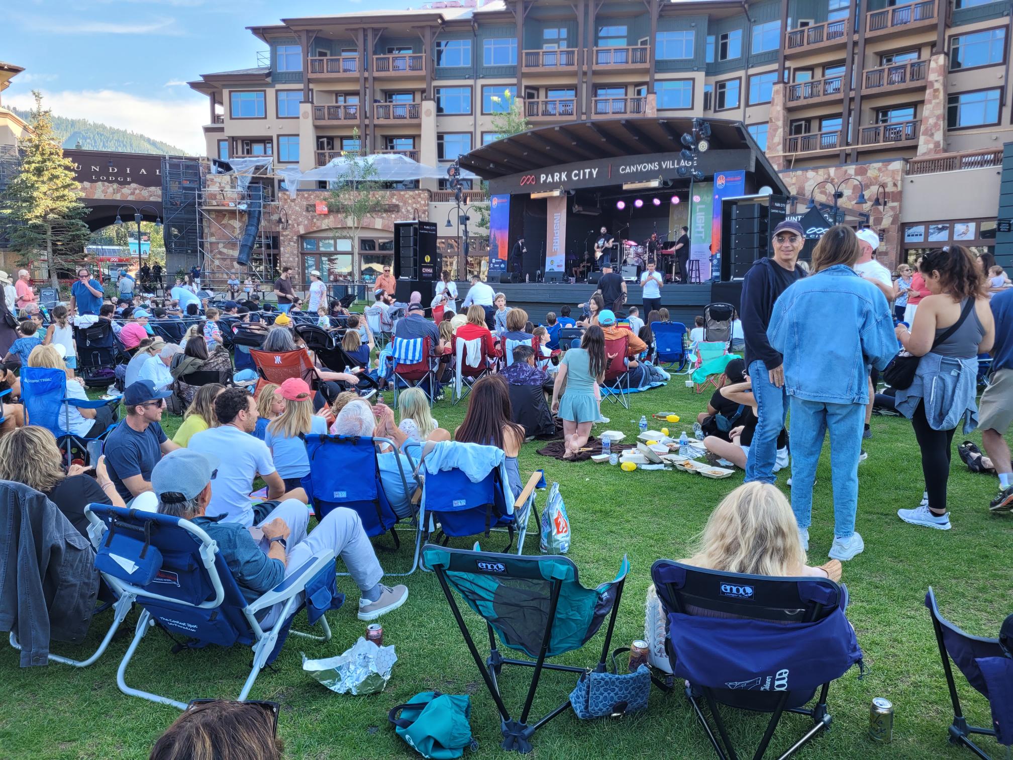 Hundreds of attendees clap and sing along with The 8th Day, a Jewish musical duo performing at the Park City Jewish Festival on Wednesday.