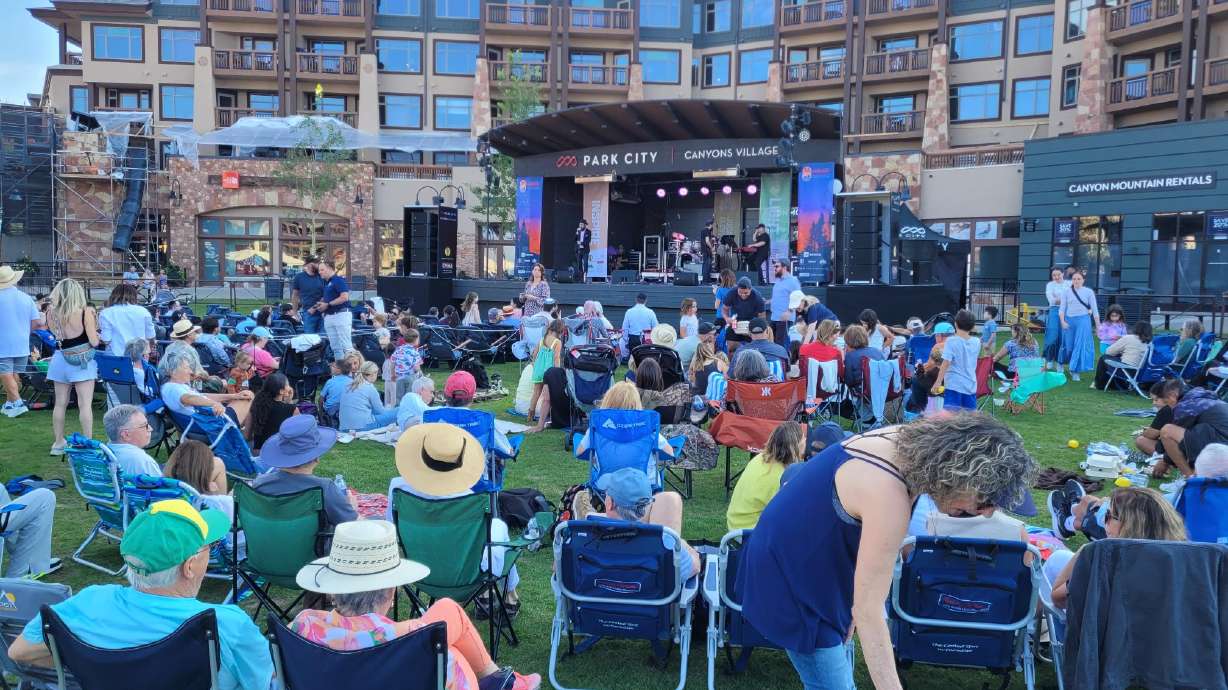 Attendees at the second Park City Jewish Festival sing and clap along with The 8th Day, a Jewish musical duo performing on stage. The festival was held Wednesday evening, bringing families from across Utah together to celebrate their culture and religion with the help of Jewish musicians.