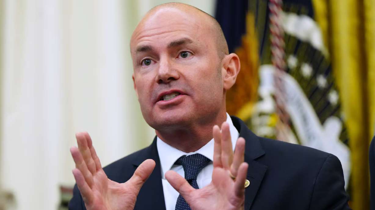 Sen. Mike Lee before President Donald Trump signs executive orders modifying two national monuments in Utah in the Oval Office of the White House, July 13, in Washington. Over 20 Republicans are joining Lee's bid to cancel recess until the Senate passes his SAVE America Act.