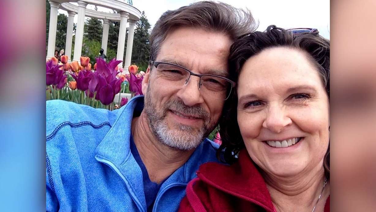 An undated photo shows Dale and Reinette Schultz posing in front of a garden. Dale was shot and killed in a mass shooting in Idaho on Sunday, and Reinette was injured.