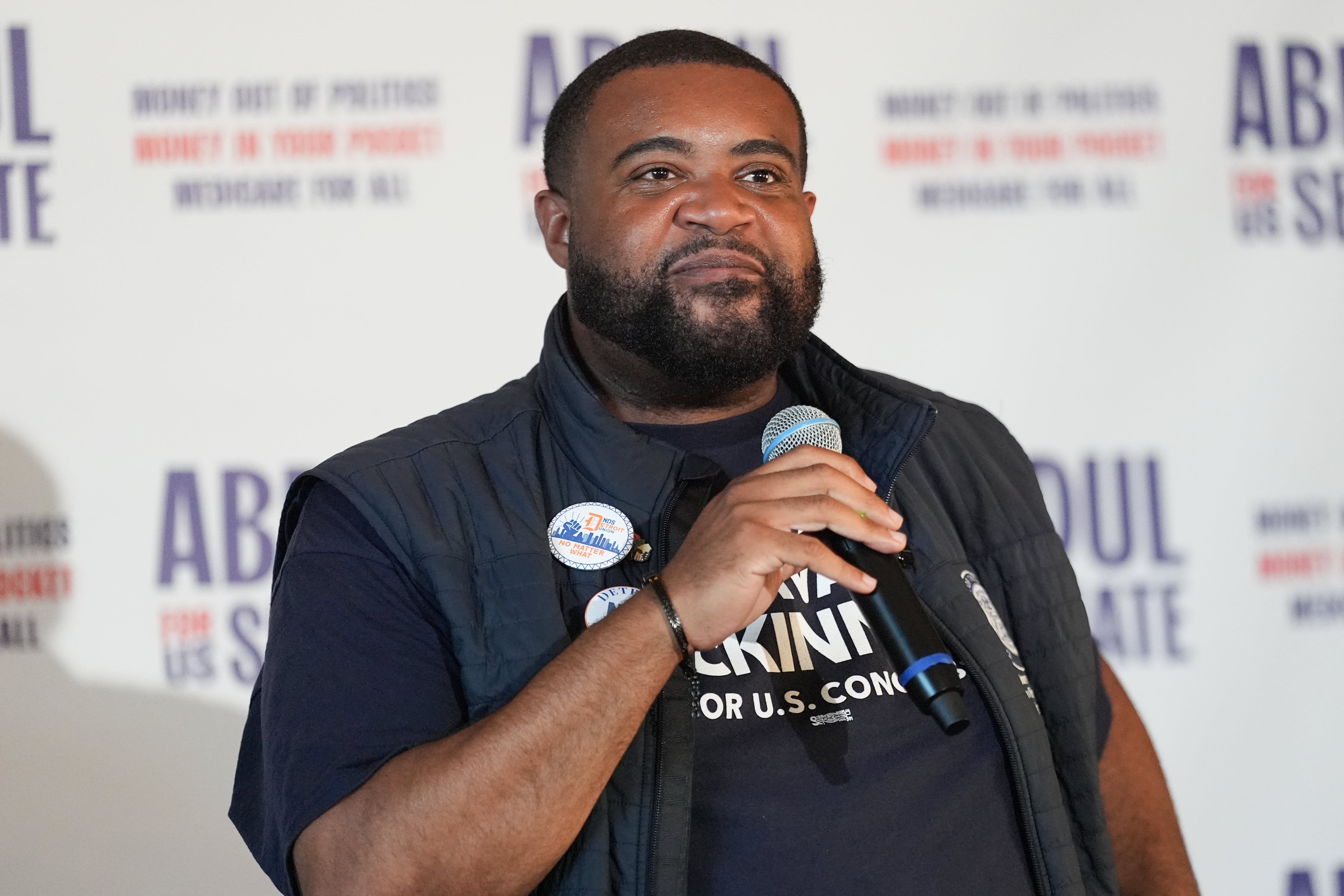 Michigan state Rep. Donavan McKinney, Democratic candidate for the House of Representatives in Michigan's 13th District, speaks at a campaign rally for Abdul El-Sayed, a progressive candidate in the Democratic primary for Senate in Michigan, Monday, in Detroit. Both McKinney and El-Sayed won their respective primary elections.
