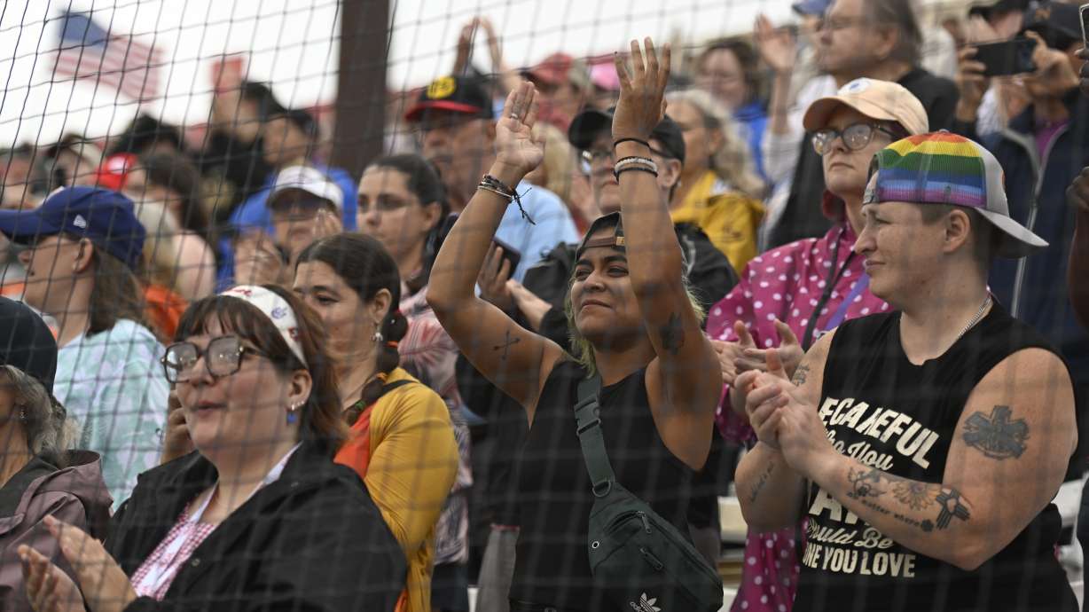Fans cheer before the inaugural Women's Professional Baseball League game between the Los Angeles Queens and the New York Heights, Saturday, Aug. 1, 2026, in Springfield, Ill.