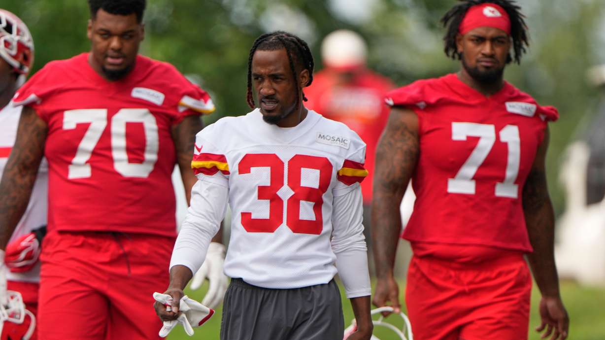 Kansas City Chiefs tackle Kahil Benson (70), cornerback L'Jarius Sneed (38) and tackle Josh Simmons (71) arrive at NFL football training camp Wednesday, July 29, 2026, in St. Joseph, Mo.