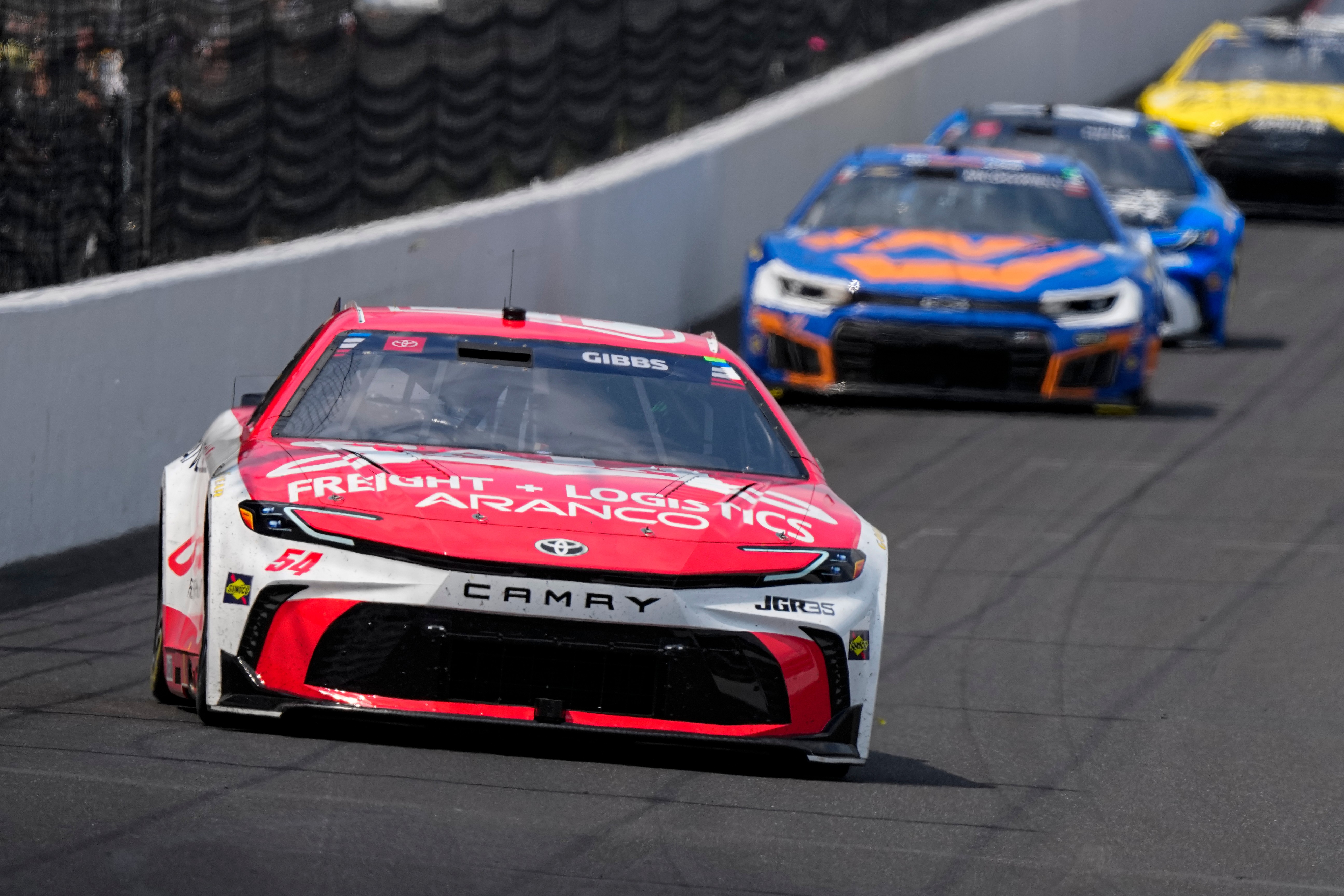 Ty Gibbs (54) heads into the first turn during a NASCAR Cup Series auto race at Indianapolis Motor Speedway in Indianapolis, Sunday, July 26, 2026. 