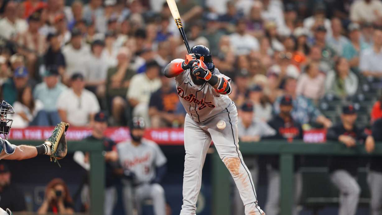 Detroit Tigers' Gleyber Torres is hit by a pitch in the eighth inning of a baseball game against the Seattle Mariners, Wednesday, Aug. 5, 2026, in Seattle.