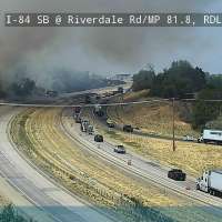Video shows fire threatening building in Riverdale along I-84