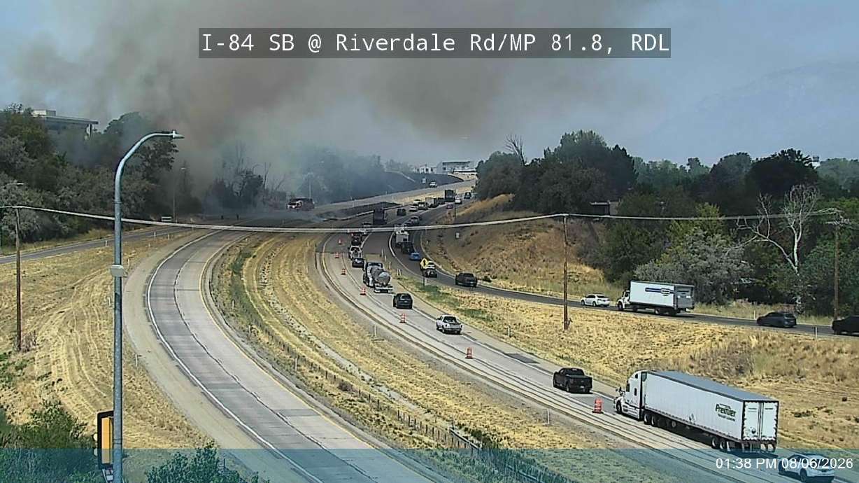 Smoke rises from a fire along interstate 84 in Riverdale on Thursday. At one point, flames were visible on the traffic camera videos.