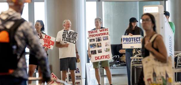 Immigrant advocates picket against immigrant detainee flights at Salt Lake airport