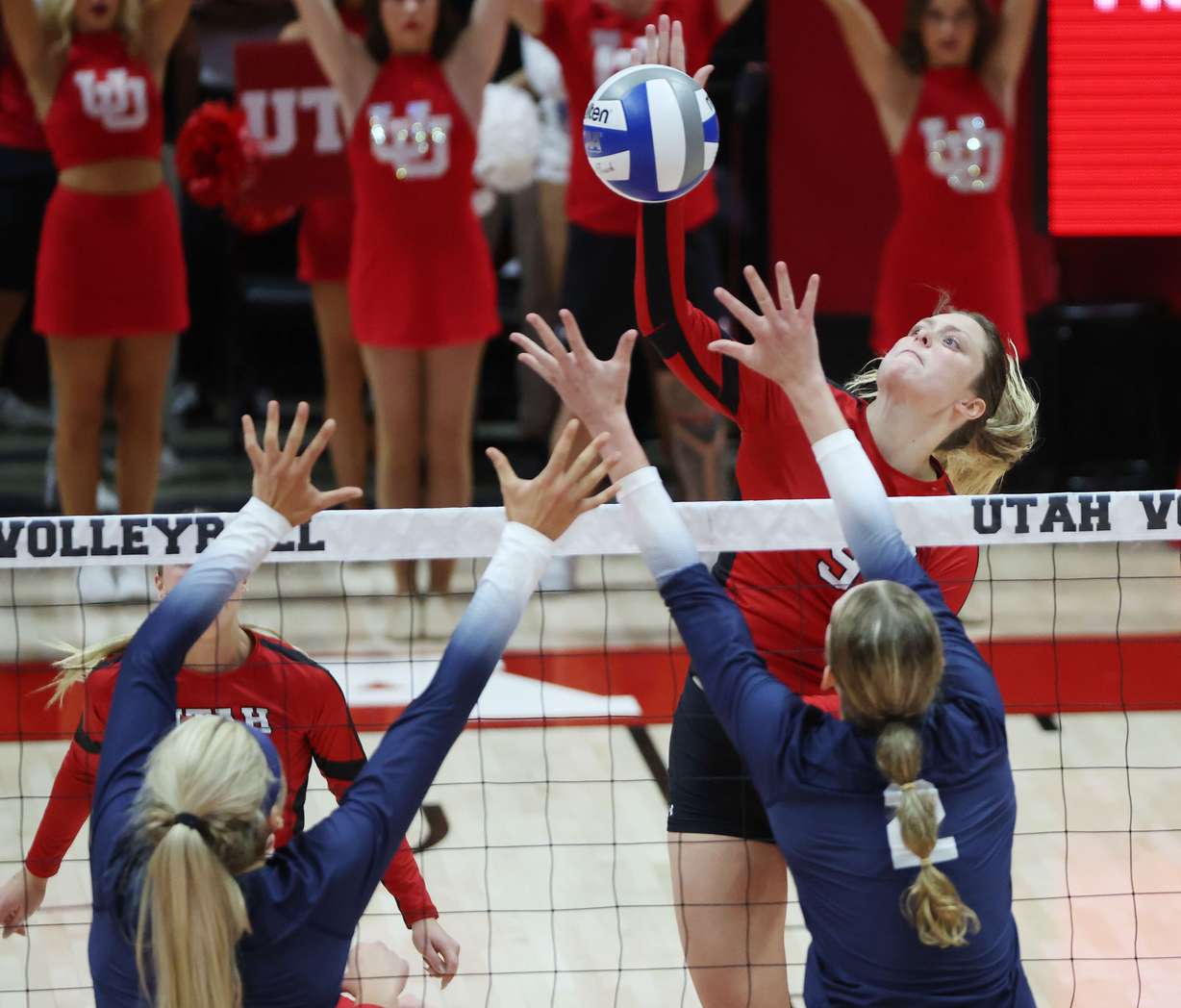 Utah’s KJ Burgess hits against BYU in volleyball in Salt Lake City on Thursday, Sept. 15, 2022.