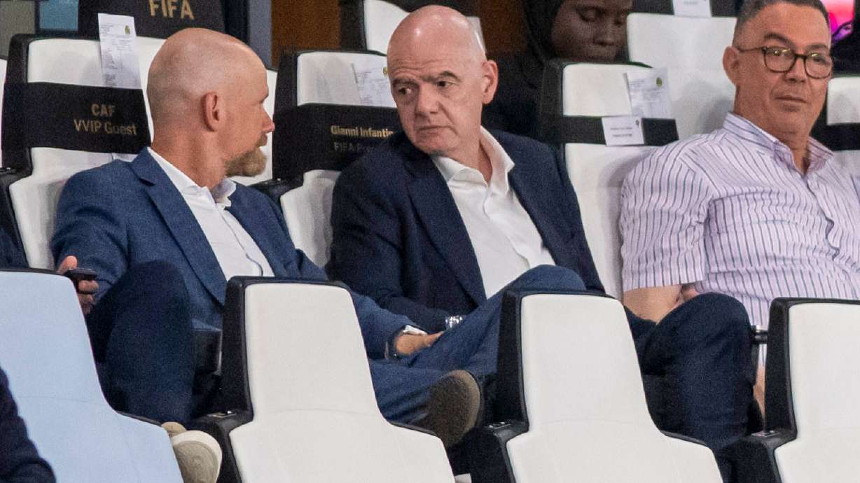 FIFA president Gianni Infantino, center, speaks to FIFA secretary general Mattias Grafstrom, left, sitting beside president of Moroccan Royal Football Federation Fouzi Lekjaa as they attend a Women's AFCON 2026 soccer match between Malawi and Zambia, in Rabat, Morocco, Wednesday, Aug. 5, 2026.