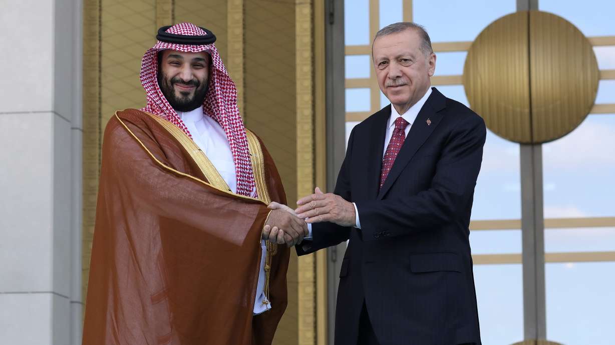 Turkish President Recep Tayyip Erdogan, right, and Saudi Crown Prince Mohammed bin Salman shake hands during a welcome ceremony, in Ankara, Turkey, June 22, 2022.