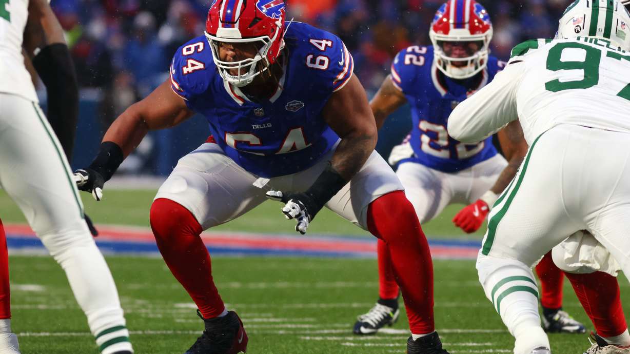 FILE - Buffalo Bills guard O'Cyrus Torrence (64) blocks during the first half of an NFL football game against the New York Jets in Orchard Park, N.Y., Sunday Jan. 4, 2026.