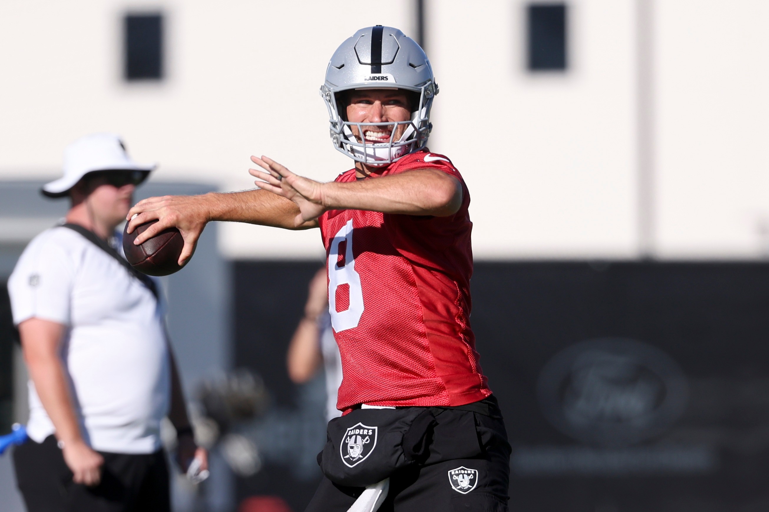 Las Vegas Raiders quarterback Kirk Cousins (8) throws a pass during practice at the team's NFL football training camp, Thursday, July 30, 2026, in Henderson, Nev. 