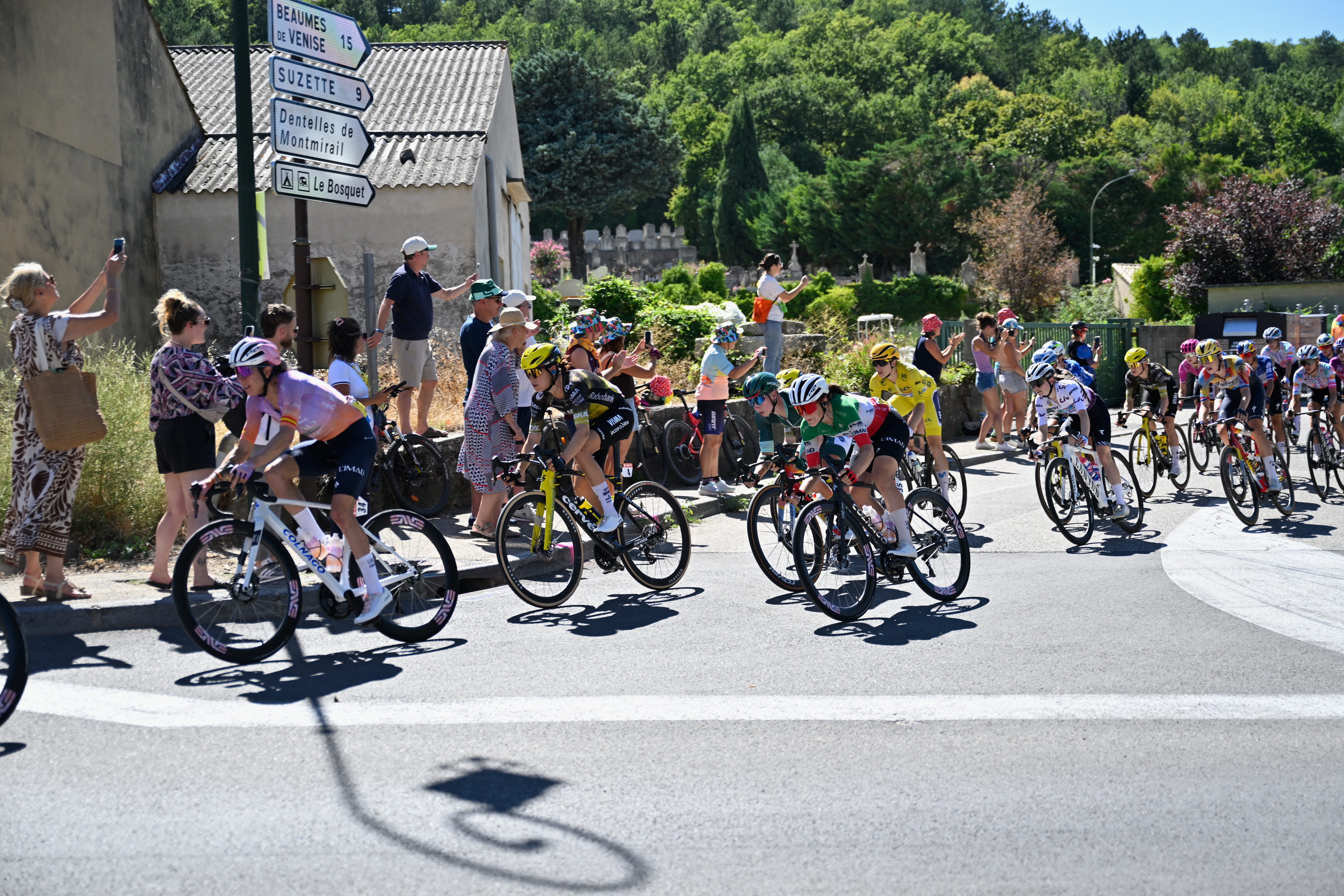 People watch the break away riders during the seventh stage of the Women's Tour de France cycling race (Tour de France Femmes) between La Voulte-sur-Rhone and Mont Ventoux in Malaucene, France, Friday, Aug. 7, 2026. 