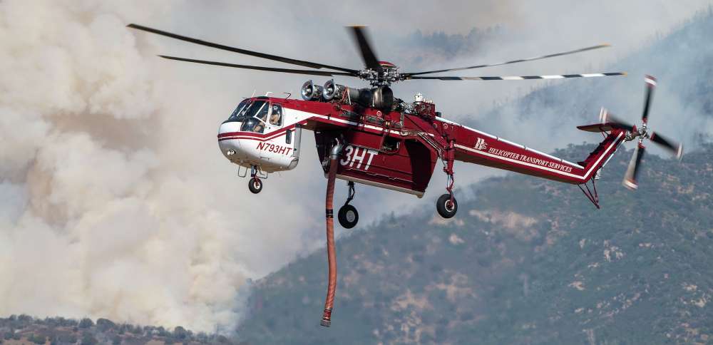 Status of 2 on board firefighting helicopter unknown after crash near Widemouth 2 Fire