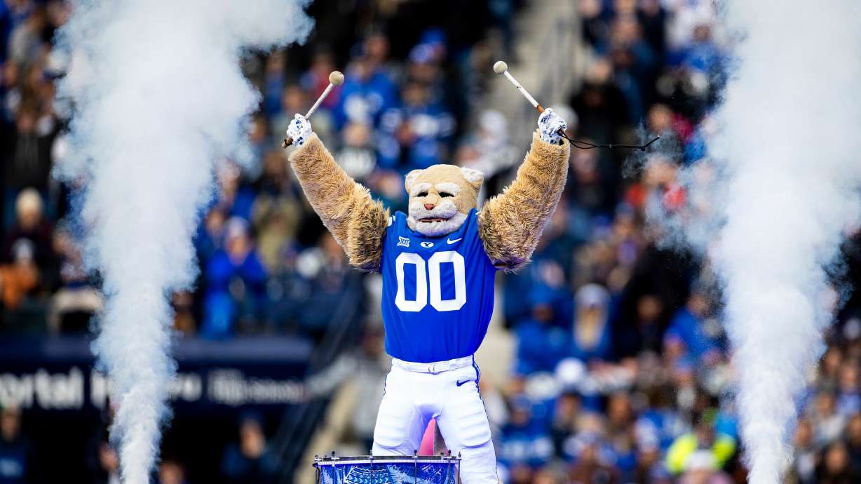 Cosmo the Cougar pumps up the crowd before the start of the fourth quarter of BYU's football game against the UCF Knights at LaVell Edwards Stadium in Provo on Nov. 29. The acclaimed mascot was selected for induction into the Mascot Hall of Fame.