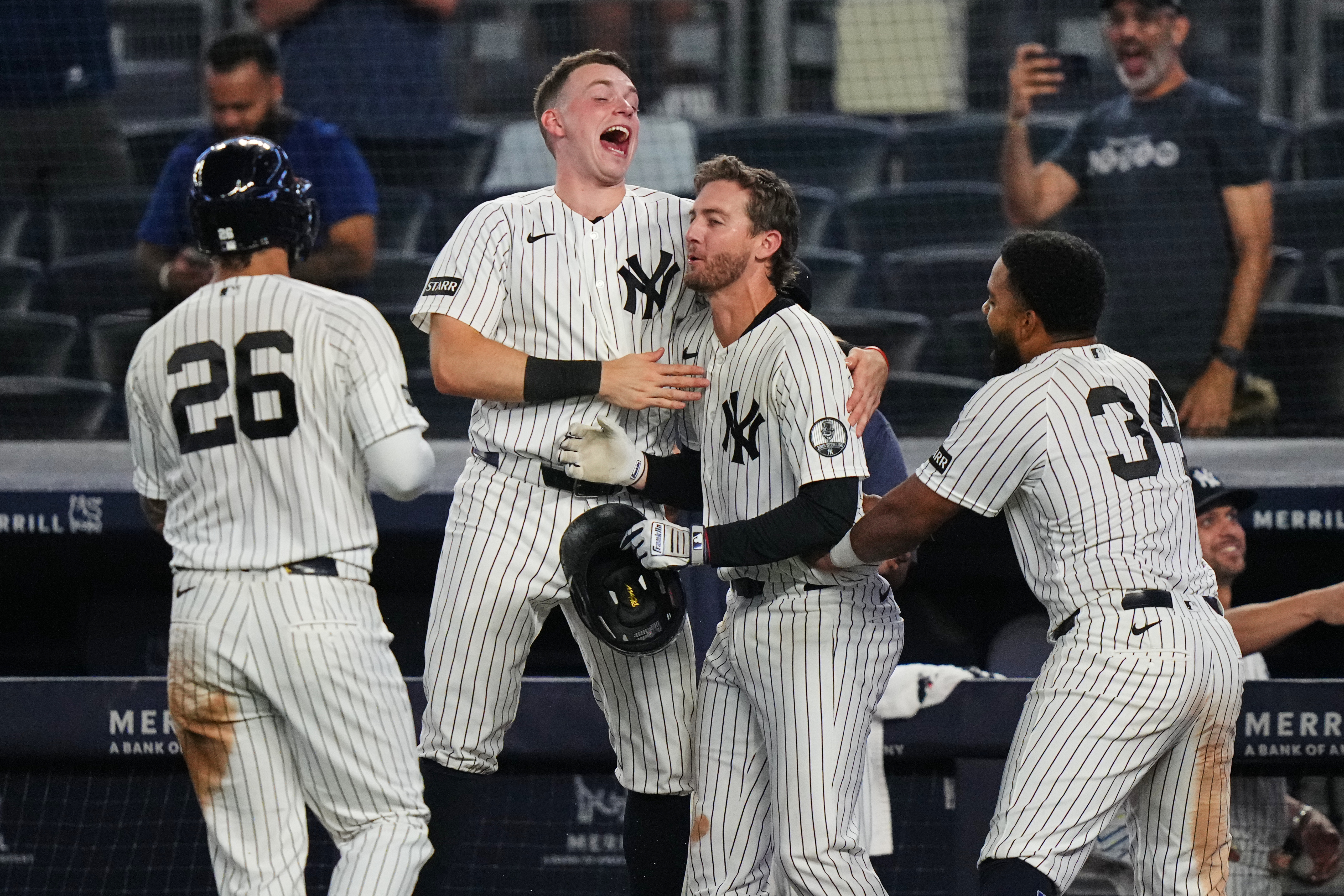New York Yankees' Ryan McMahon, center, celebrates with Heliot Ramos, right, Ben Rice, second from left, and Luis García Jr. after a baseball game against the Atlanta Braves Saturday, Aug. 8, 2026, in New York. 