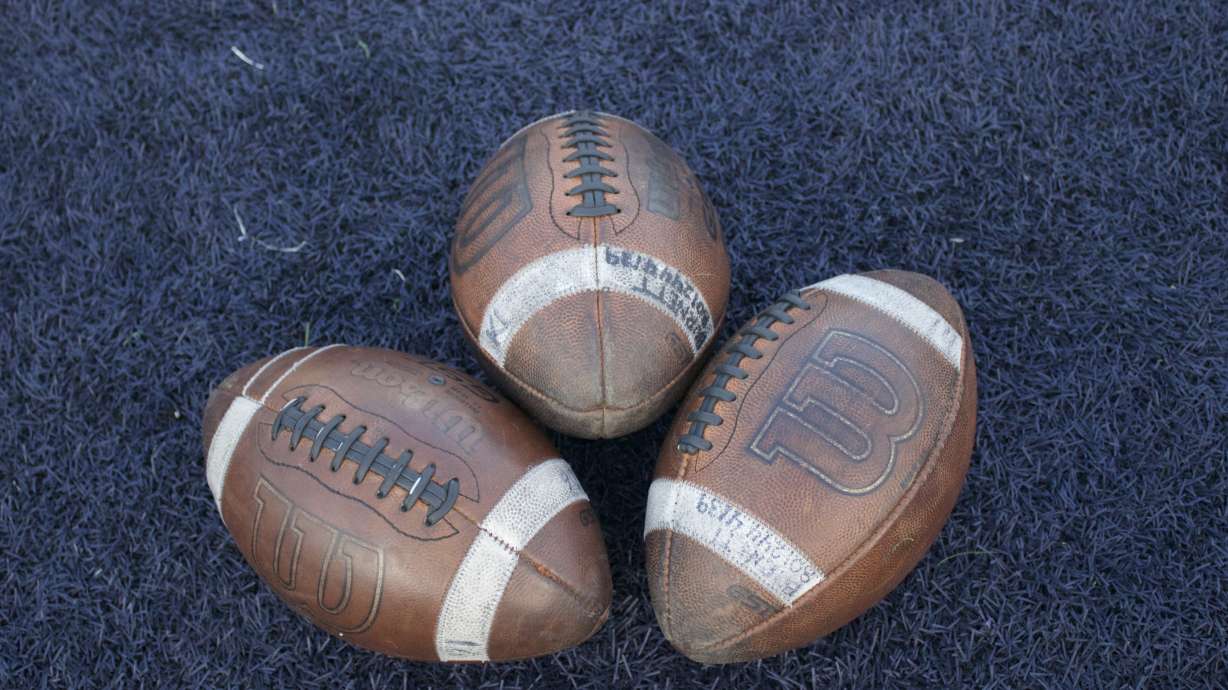 Footballs and other equipment during a Utah high school football scrimmage at Corner Canyon High School in Draper, Friday, Aug. 7, 2026.