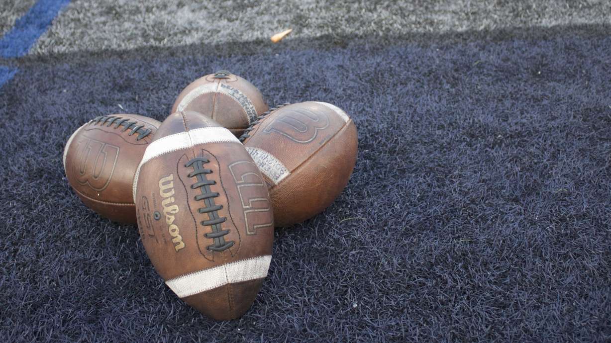 Footballs and other equipment during a Utah high school football scrimmage at Corner Canyon High School in Draper, Friday, Aug. 7, 2026.