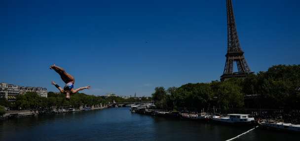 High divers take the plunge in the Seine in a new test of Paris' reclaimed river